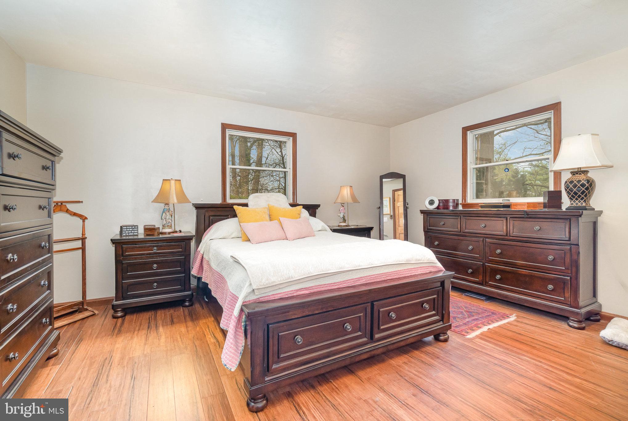 99 Fogelsanger Road Shippensburg, PA 17257 - Photo 22 of 55 a bedroom with a bed and wooden floor