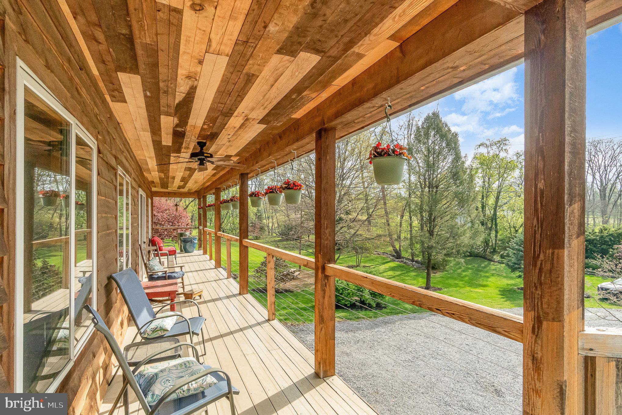 99 Fogelsanger Road Shippensburg, PA 17257 - Photo 46 of 55 a view of porch with wooden floor and outdoor space