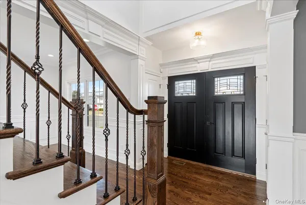 a view of an entryway with staircase