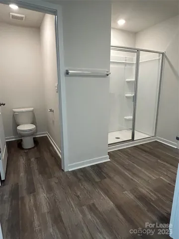 a bathroom with a double vanity sink and mirror