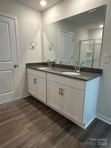 a view of an empty walk in closet