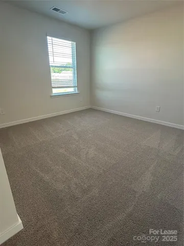a bathroom with a toilet and a bathtub