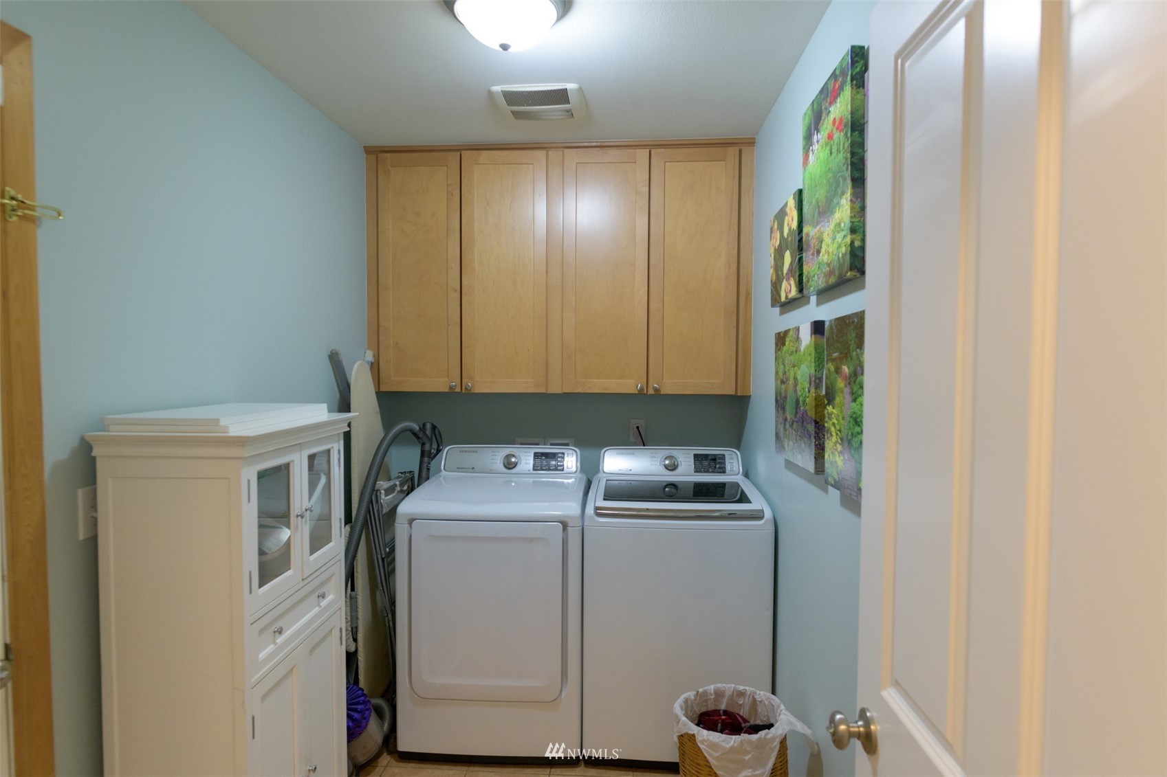 713 Sylvan Way Bremerton, WA 98310 - Photo 19 of 32 a room with storage and utility