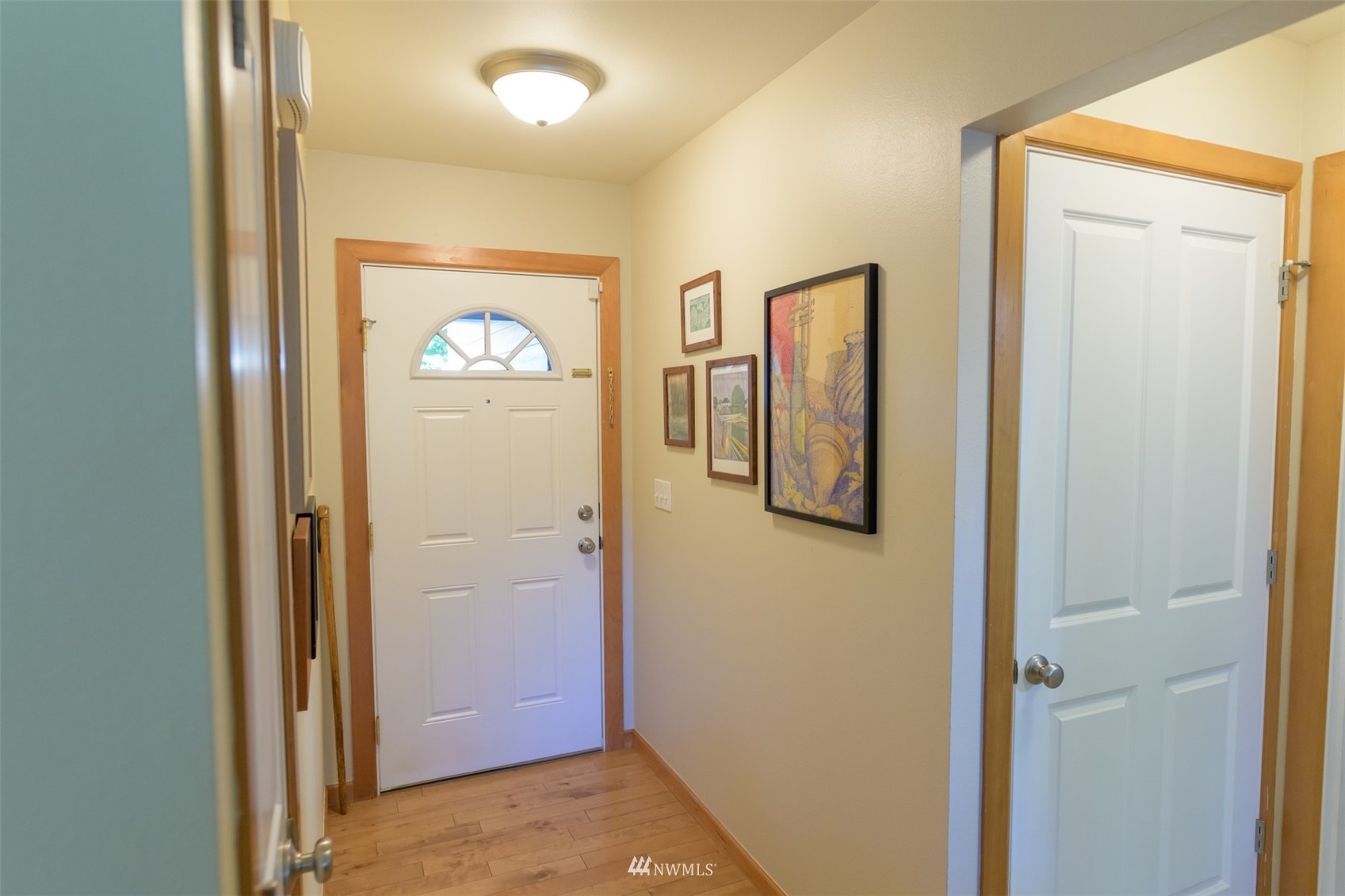 713 Sylvan Way Bremerton, WA 98310 - Photo 20 of 32 a view of an entryway with wooden floor