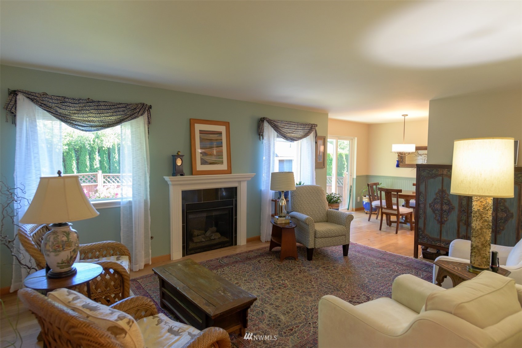 713 Sylvan Way Bremerton, WA 98310 - Photo 2 of 32 a living room with furniture and a fireplace