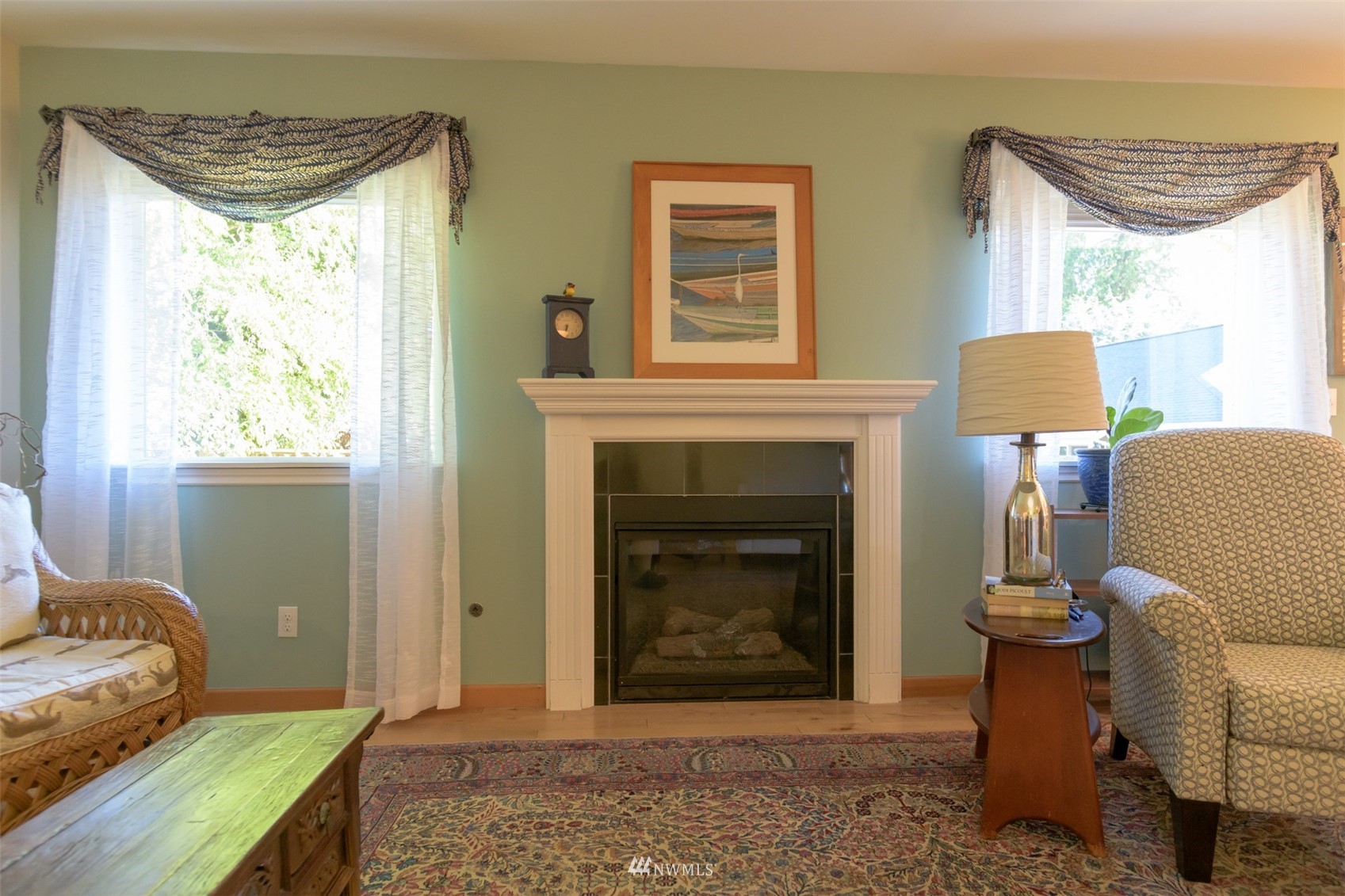713 Sylvan Way Bremerton, WA 98310 - Photo 4 of 32 a living room with furniture and a fireplace