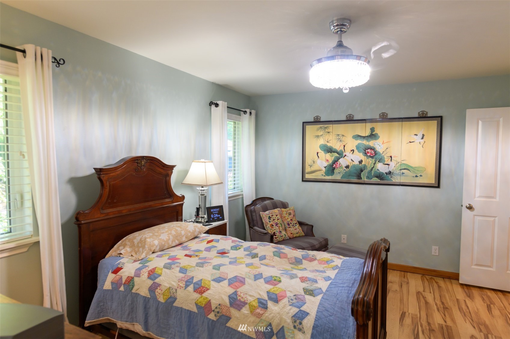 713 Sylvan Way Bremerton, WA 98310 - Photo 10 of 32 a bedroom with bed and a chandelier