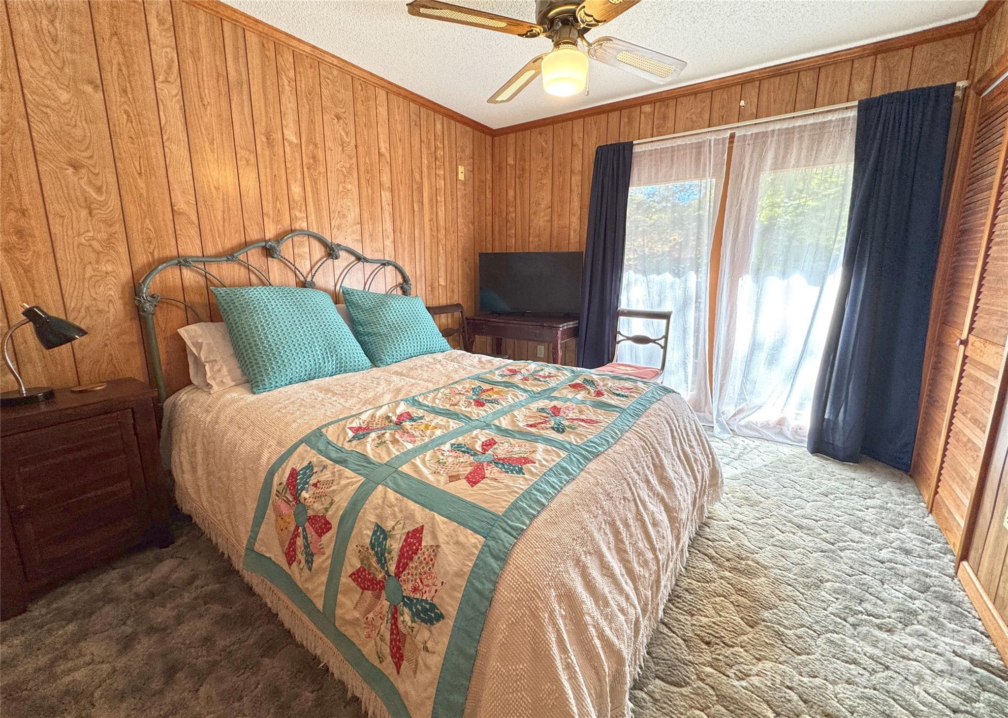 1622 Meadow Fork Road Hot Springs, NC 28743 - Photo 15 of 31 a bedroom with a bed and a window