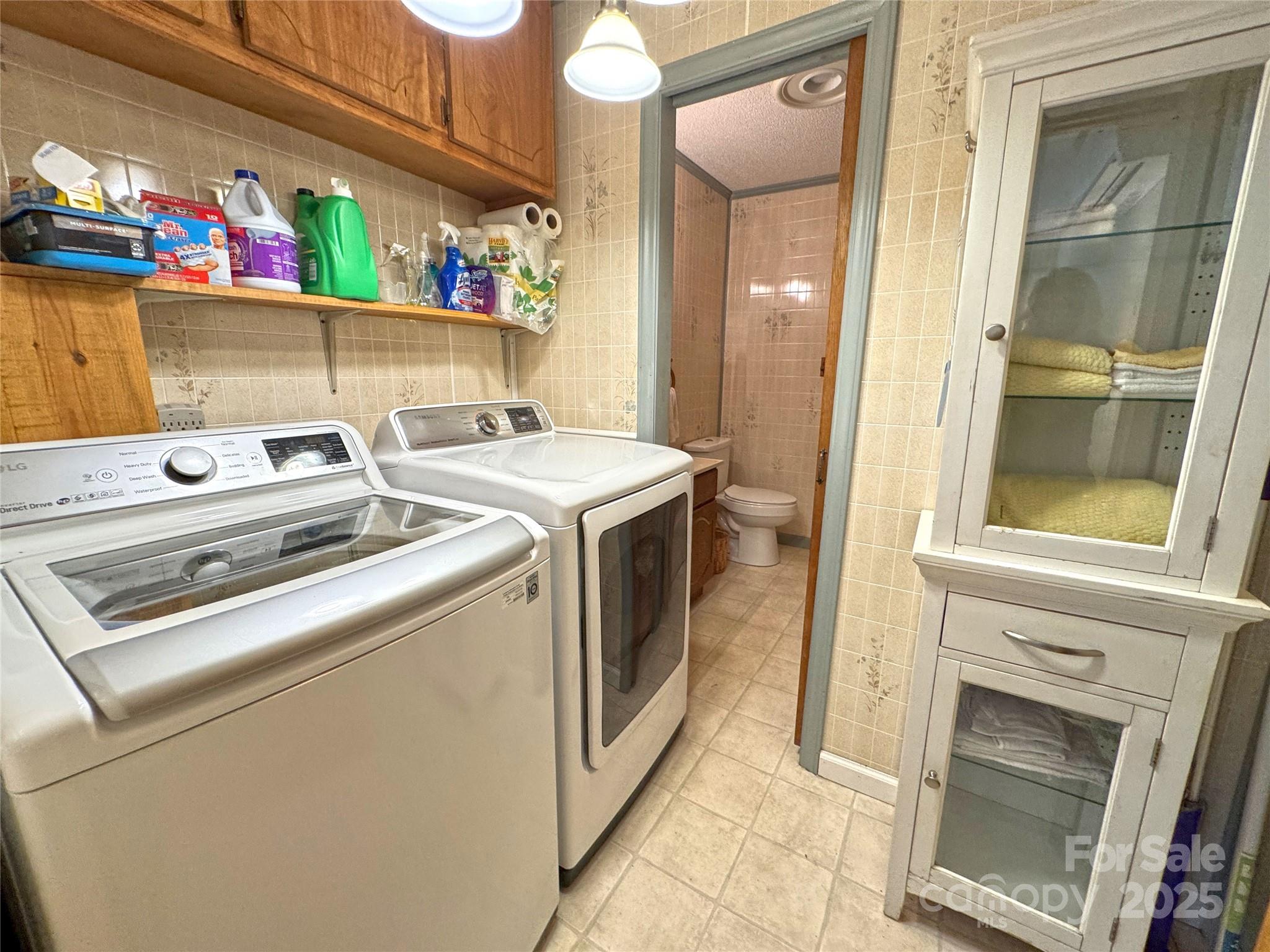 1622 Meadow Fork Road Hot Springs, NC 28743 - Photo 17 of 31 a utility room with dryer and washer