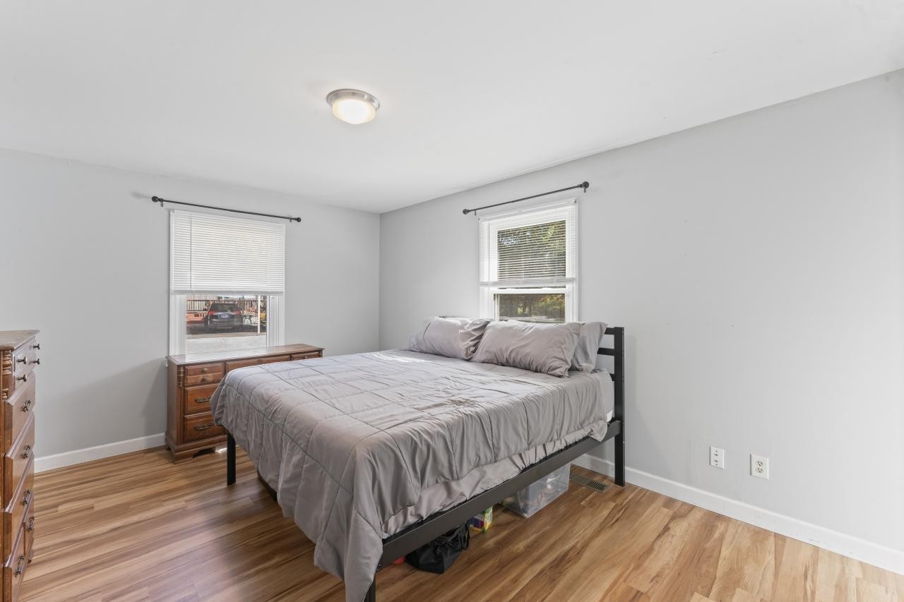 102 Aldrin Street Tullahoma, TN 37388 - Photo 12 of 21 a bedroom with a bed and window