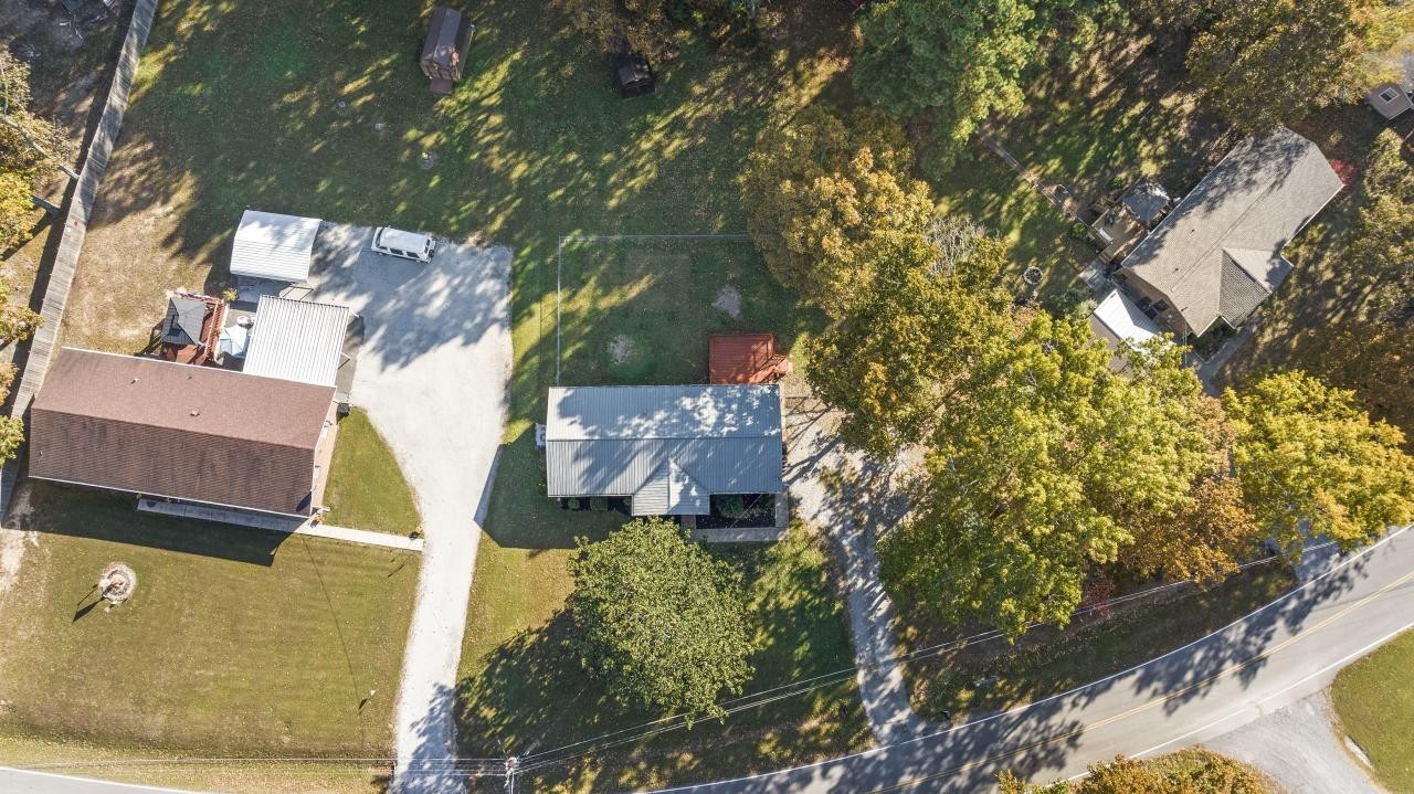 102 Aldrin Street Tullahoma, TN 37388 - Photo 20 of 21 an aerial view of a house with a yard basket ball court and outdoor seating