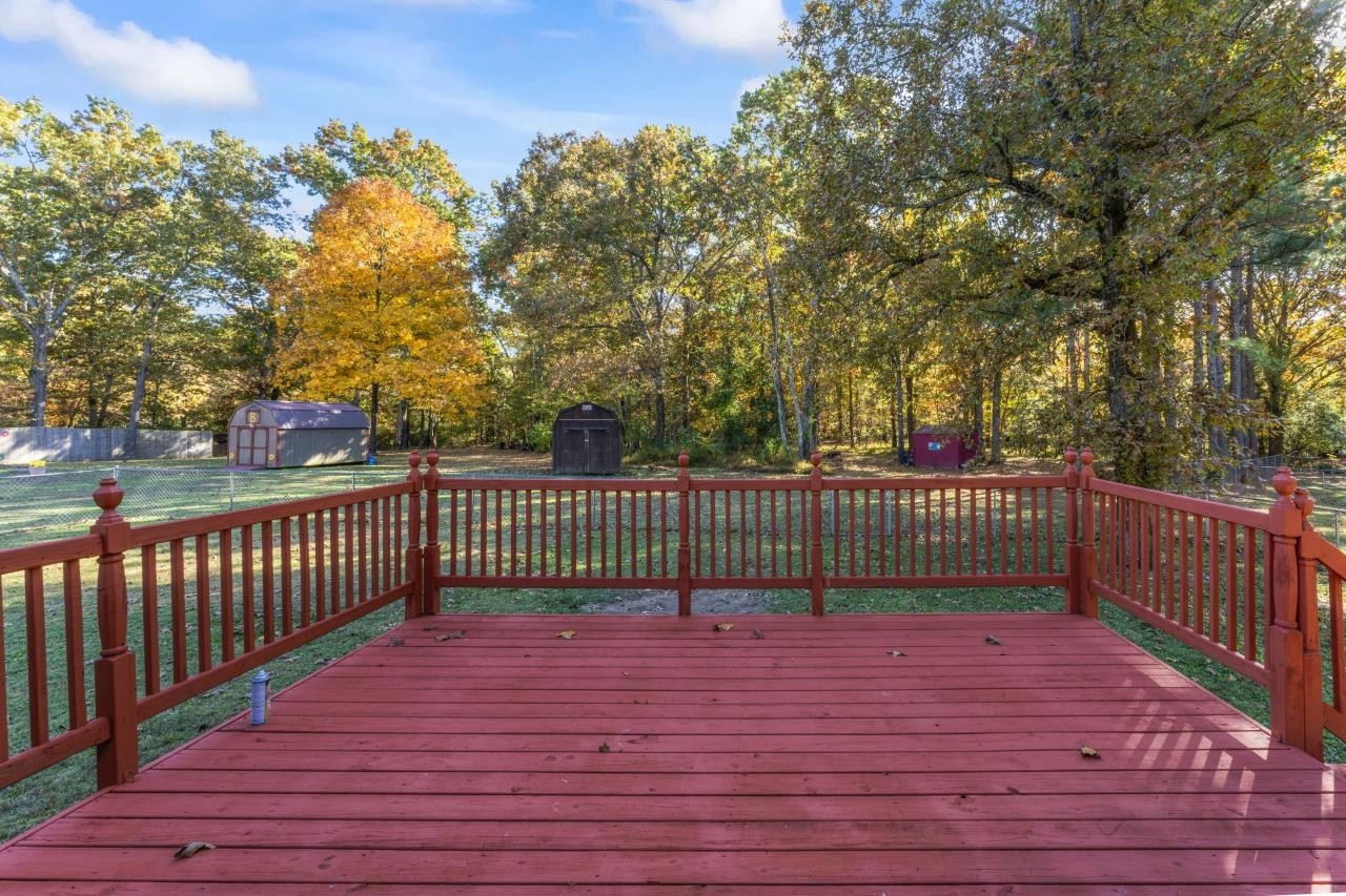 102 Aldrin Street Tullahoma, TN 37388 - Photo 2 of 21 a view of a deck with a large trees