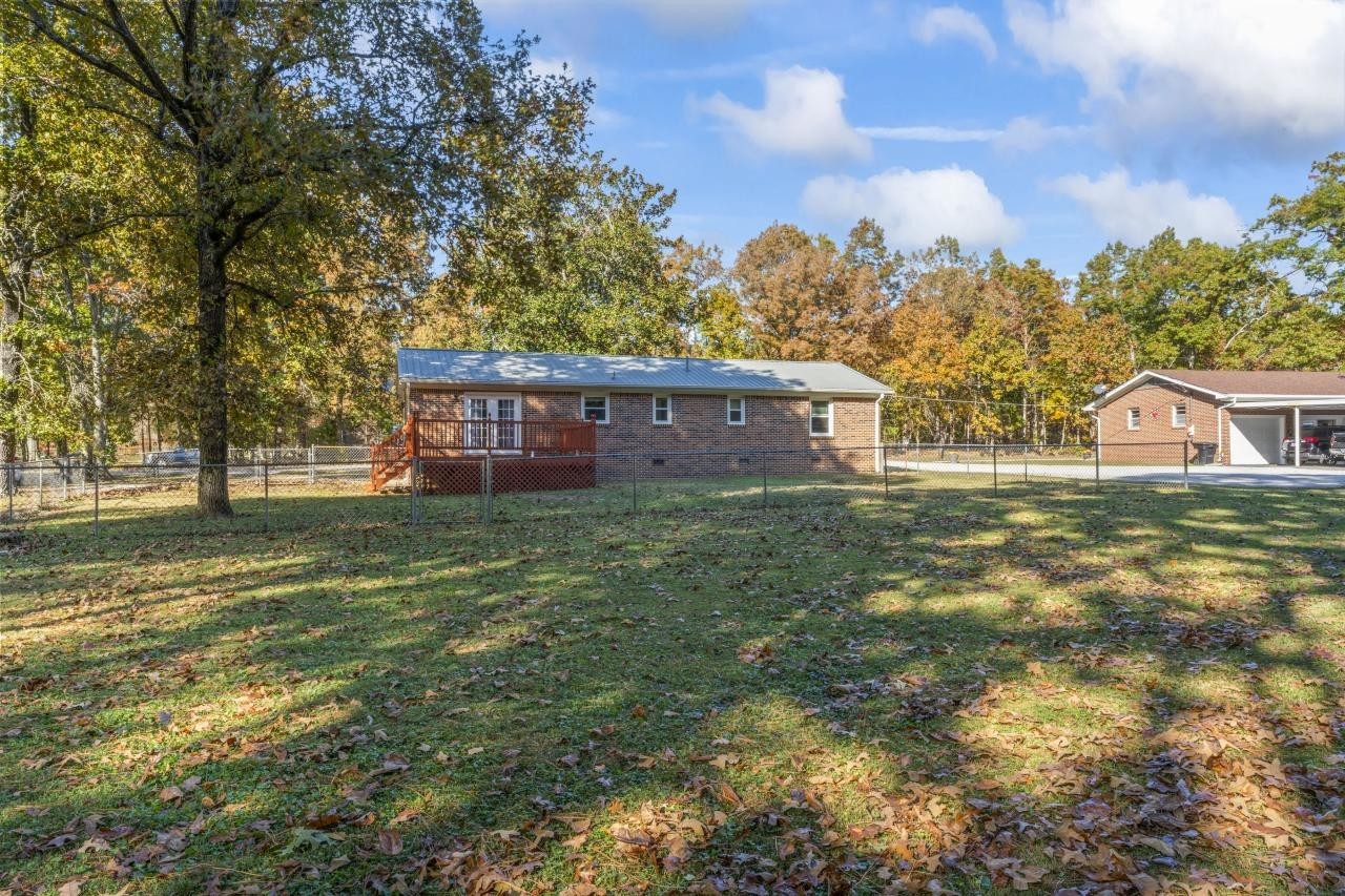 102 Aldrin Street Tullahoma, TN 37388 - Photo 5 of 21 a view of a house with a yard