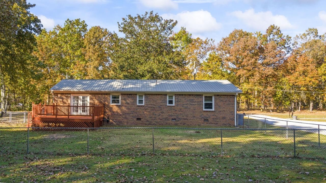 102 Aldrin Street Tullahoma, TN 37388 - Photo 8 of 21 a view of a house with a yard