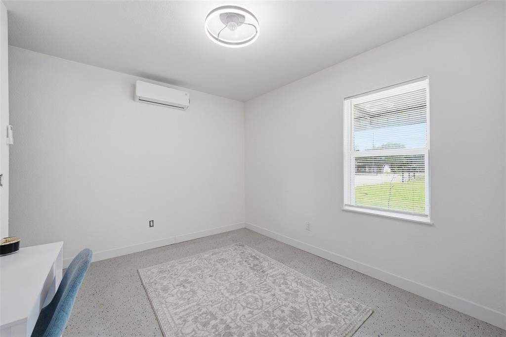 151 Kasberg Road Leroy, TX 76691 - Photo 15 of 40 an empty room with a window