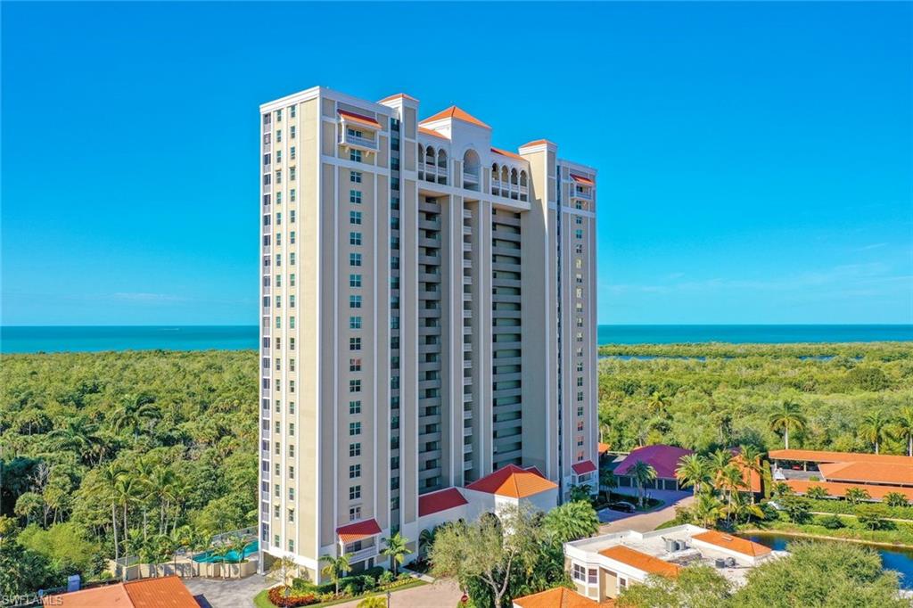 6573 Marissa Loop, Unit 1902 Naples, FL 34108 - Photo 18 of 21 a building view with outdoor space