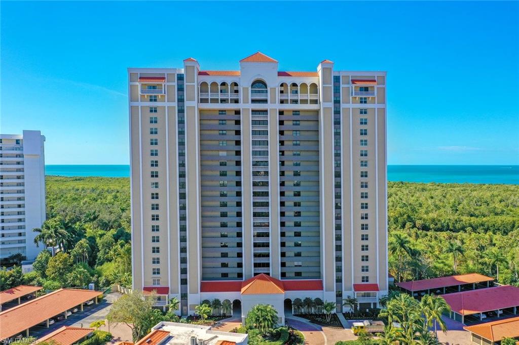 6573 Marissa Loop, Unit 1902 Naples, FL 34108 - Photo 20 of 21 a view of a city with tall buildings