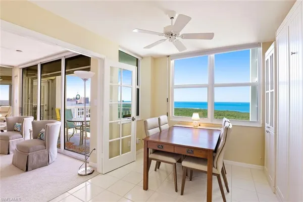 a kitchen with cabinets and window