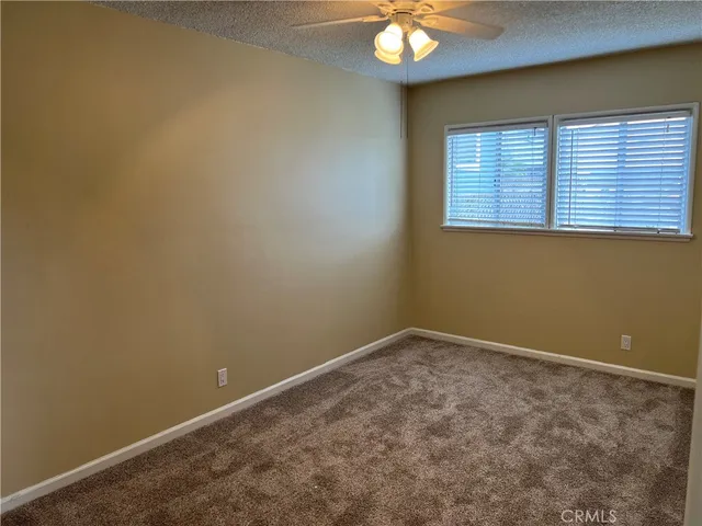 a bathroom with a toilet a sink and bathtub