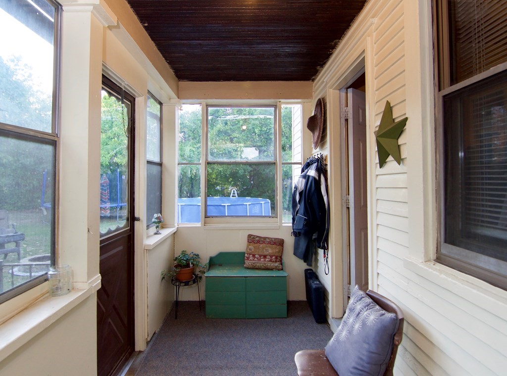 244 Allen Street Springfield, MA 01108 - Photo 8 of 42 a room with furniture and a large window