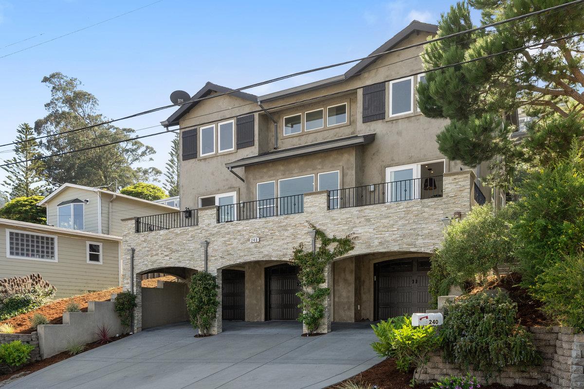 240 Stanley Avenue Pacifica, CA 94044 - Photo 2 of 100 a front view of a house with a garden