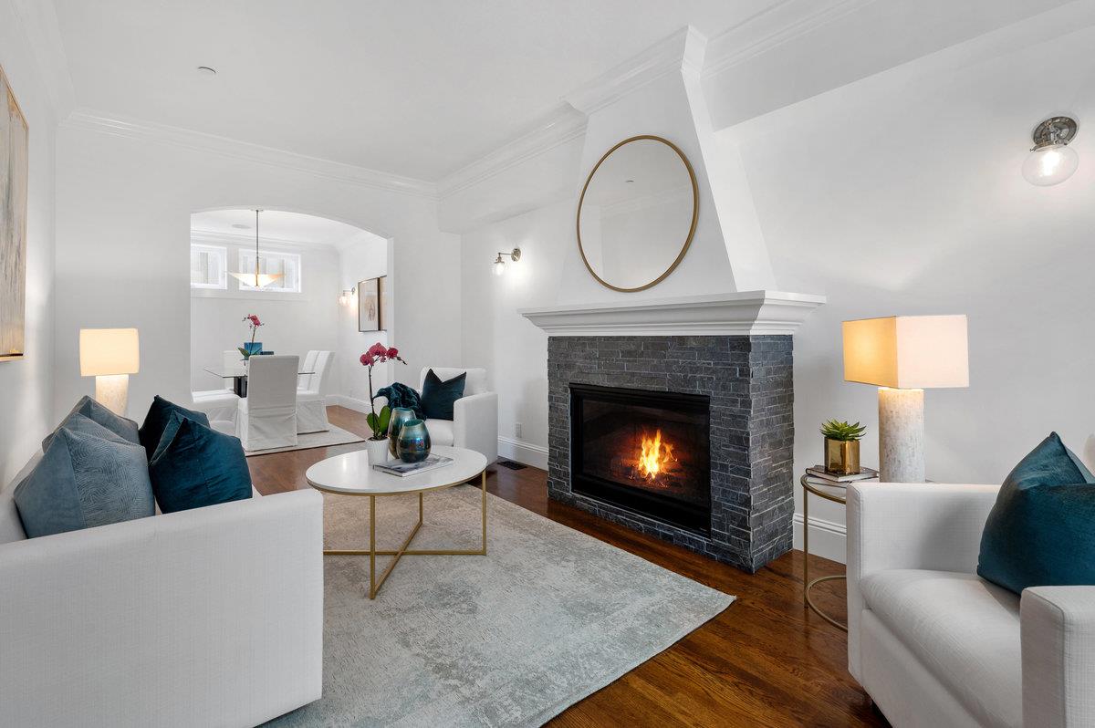 240 Stanley Avenue Pacifica, CA 94044 - Photo 29 of 100 a living room with furniture a fireplace a lamp and a fireplace