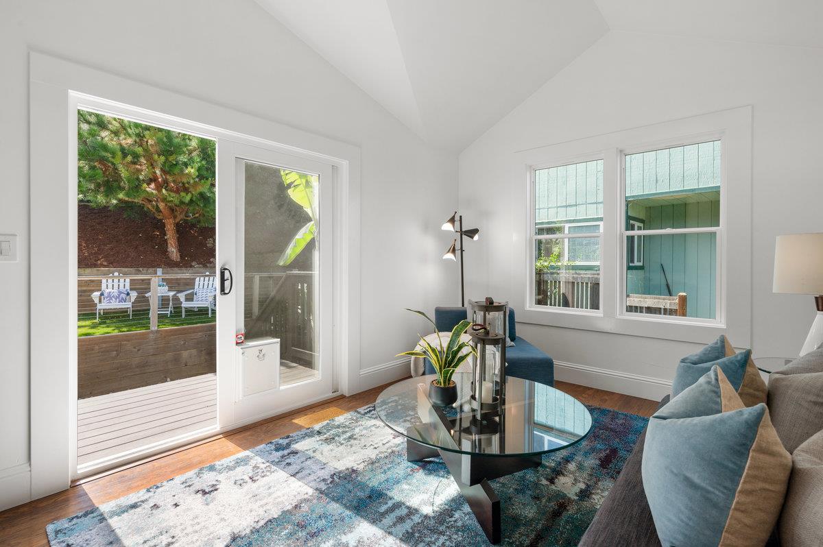 240 Stanley Avenue Pacifica, CA 94044 - Photo 52 of 100 a living room with furniture and a potted plant