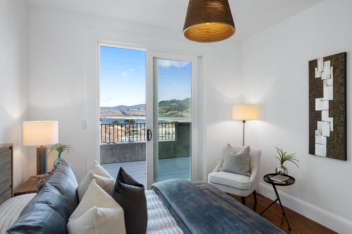 240 Stanley Avenue Pacifica, CA 94044 - Photo 58 of 100 a living room with furniture and a lamp