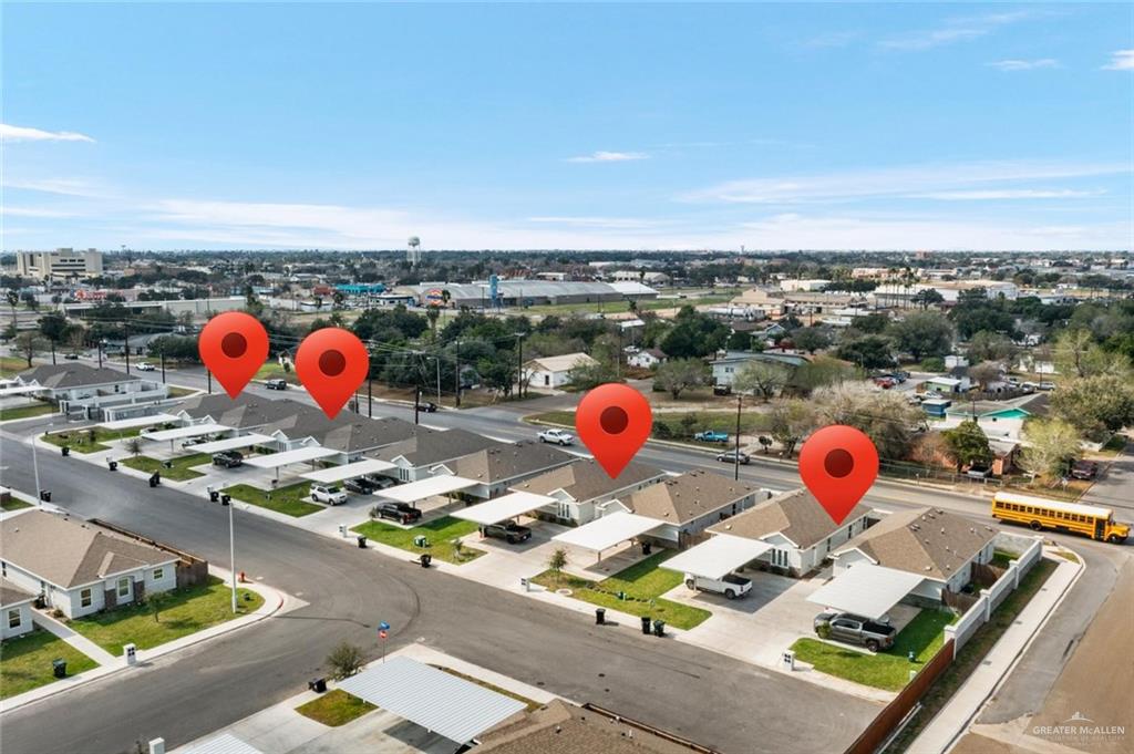 304 Retama Lane, Unit 2 Weslaco, TX 78596 - Photo 9 of 10 an outdoor view with sitting space