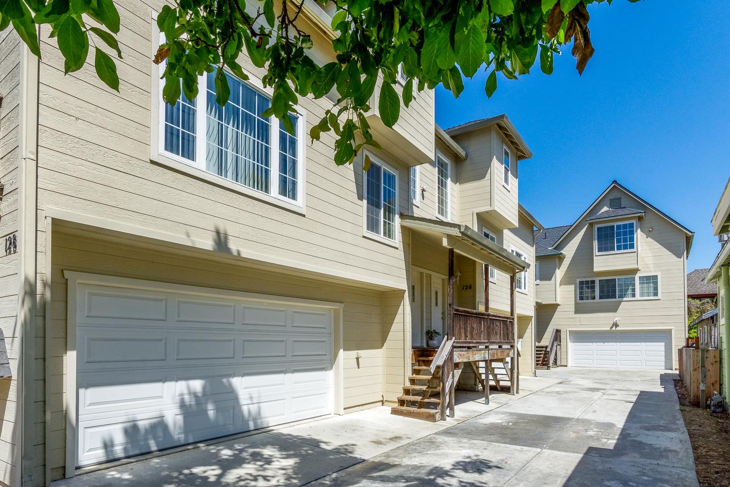 124 Sycamore Street Santa Cruz, CA 95060 - Photo 1 of 40 a front view of a house with a garden