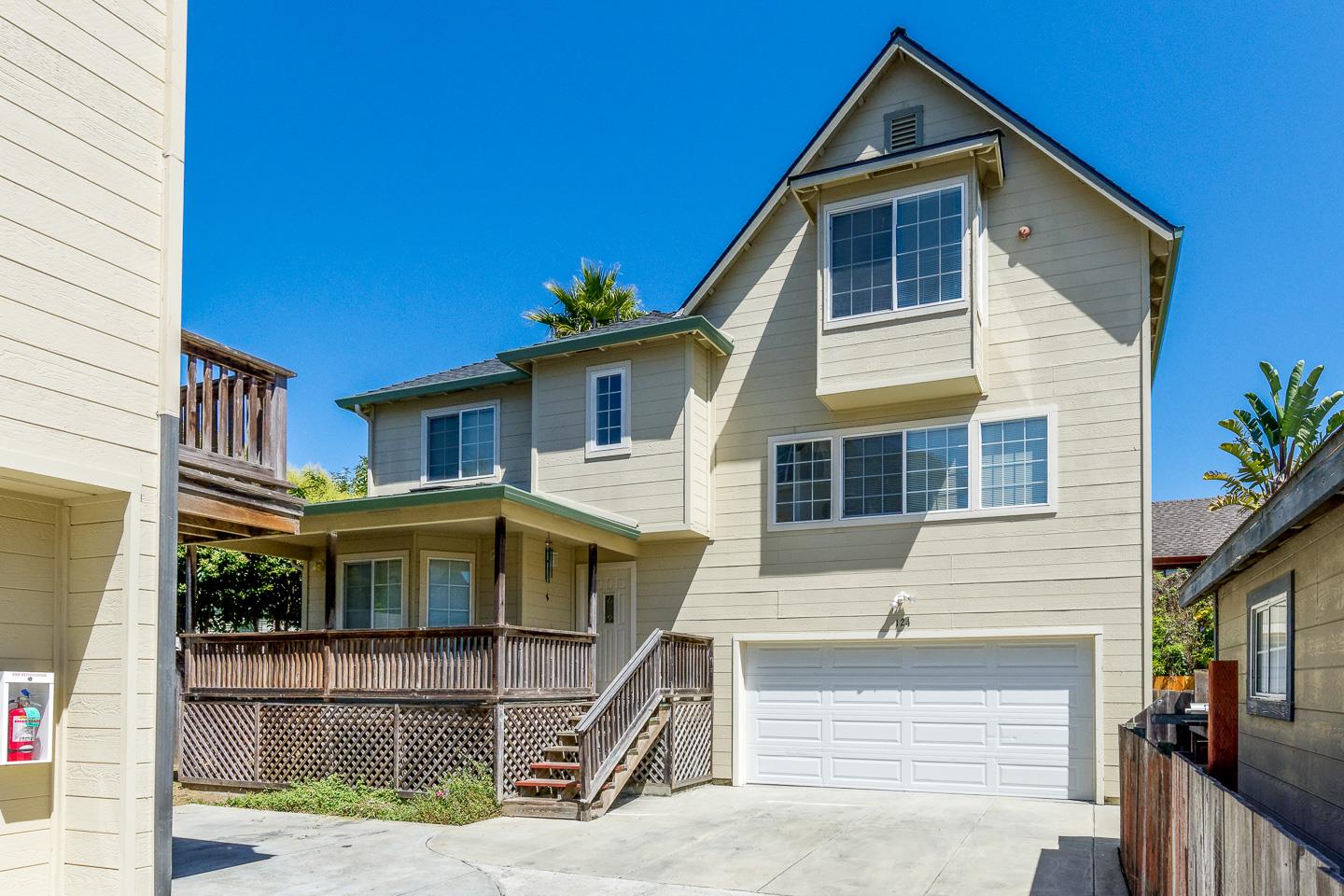 124 Sycamore Street Santa Cruz, CA 95060 - Photo 3 of 40 a front view of a house with garage
