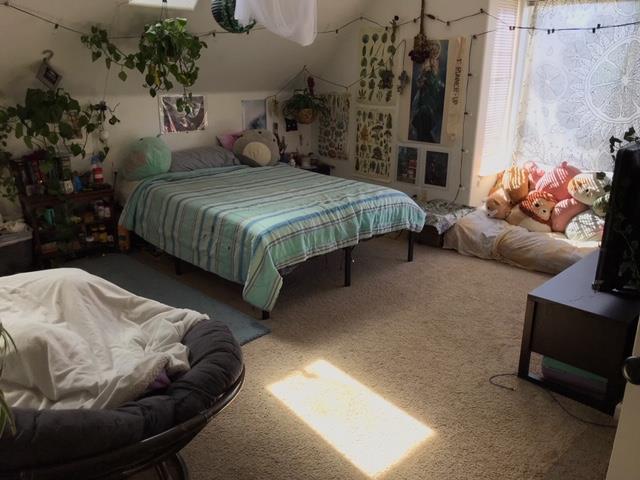 124 Sycamore Street Santa Cruz, CA 95060 - Photo 40 of 40 a bedroom with a bed and a couch
