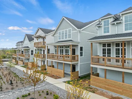 a view of a house with a big yard
