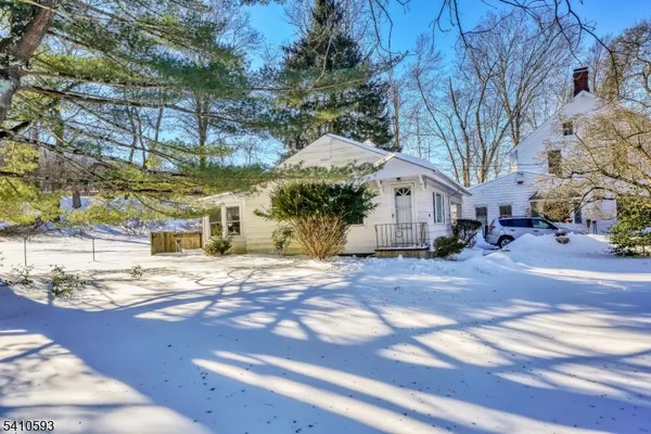 a view of a street with houses
