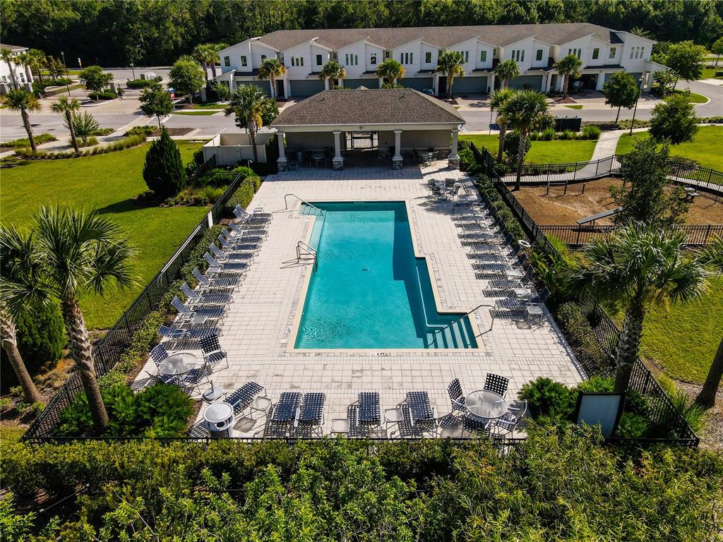 3470 Beau Road Kissimmee, FL 34746 - Photo 29 of 40 a aerial view of a house with garden space and sitting area