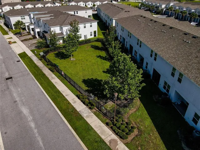 a view of a garden with an outdoor space
