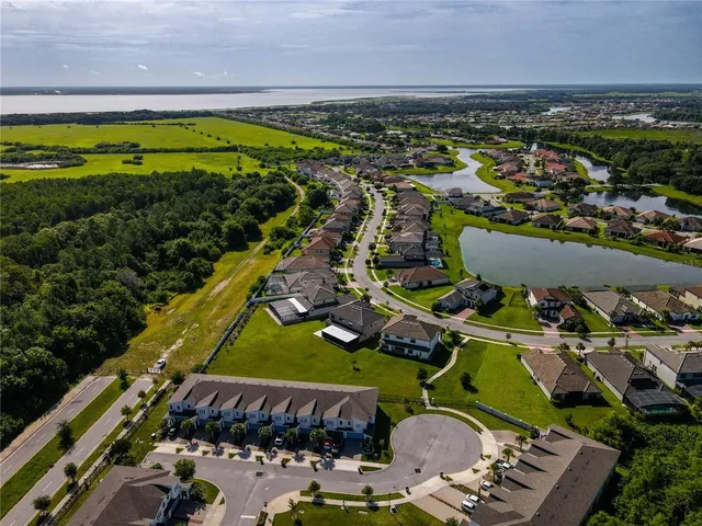 an aerial view of a building with outdoor space