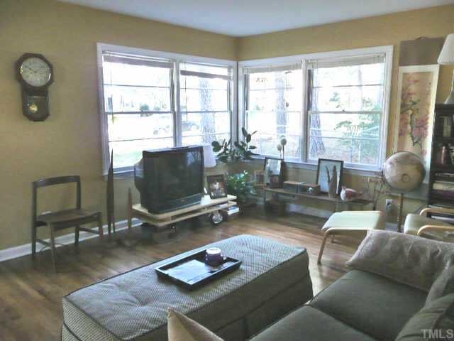600 Edmund Street Raleigh, NC 27604 - Photo 2 of 12 a living room with furniture and a window