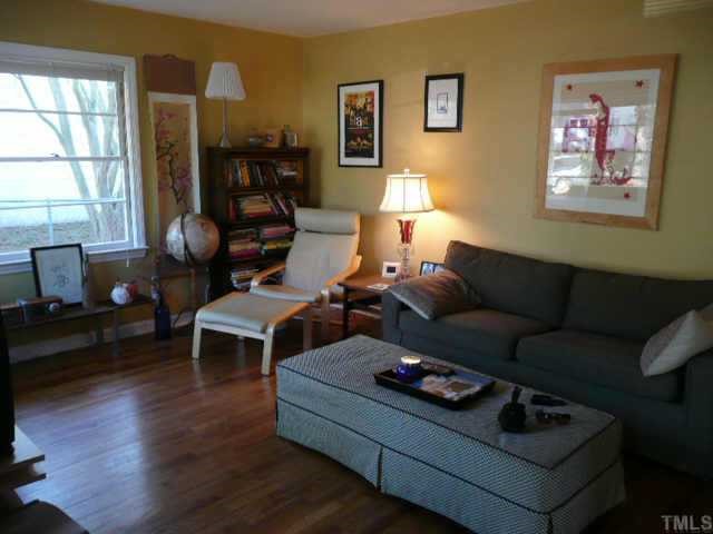 600 Edmund Street Raleigh, NC 27604 - Photo 4 of 12 a living room with furniture and wooden floor