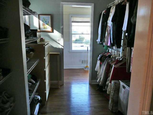 600 Edmund Street Raleigh, NC 27604 - Photo 8 of 12 a view of walk in closet with clothes and shoes