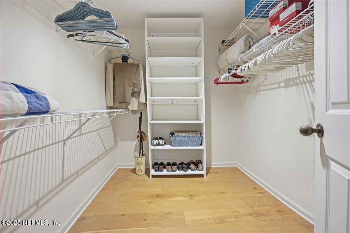 84 Players Club Villas Road Ponte Vedra Beach, FL 32082 - Photo 15 of 20 a view of a room with shelves