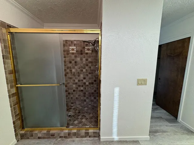 a room with a sink and a mirror