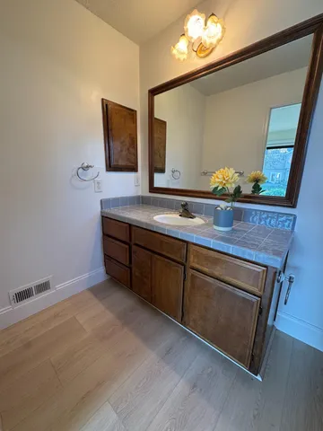 a bathroom with a sink and a tub