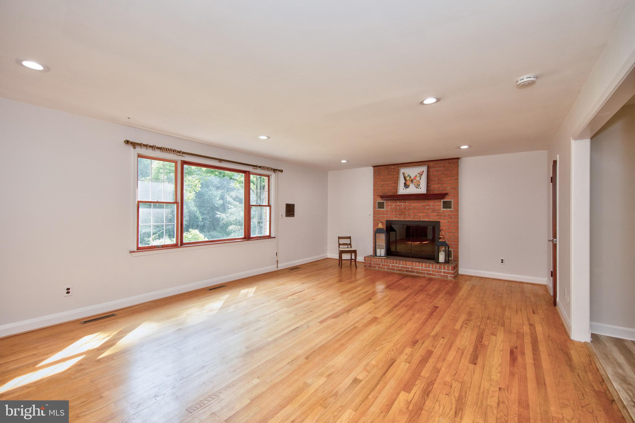 13711 Killarney Court Phoenix, MD 21131 - Photo 28 of 78 Spacious family room with wood burning fireplace