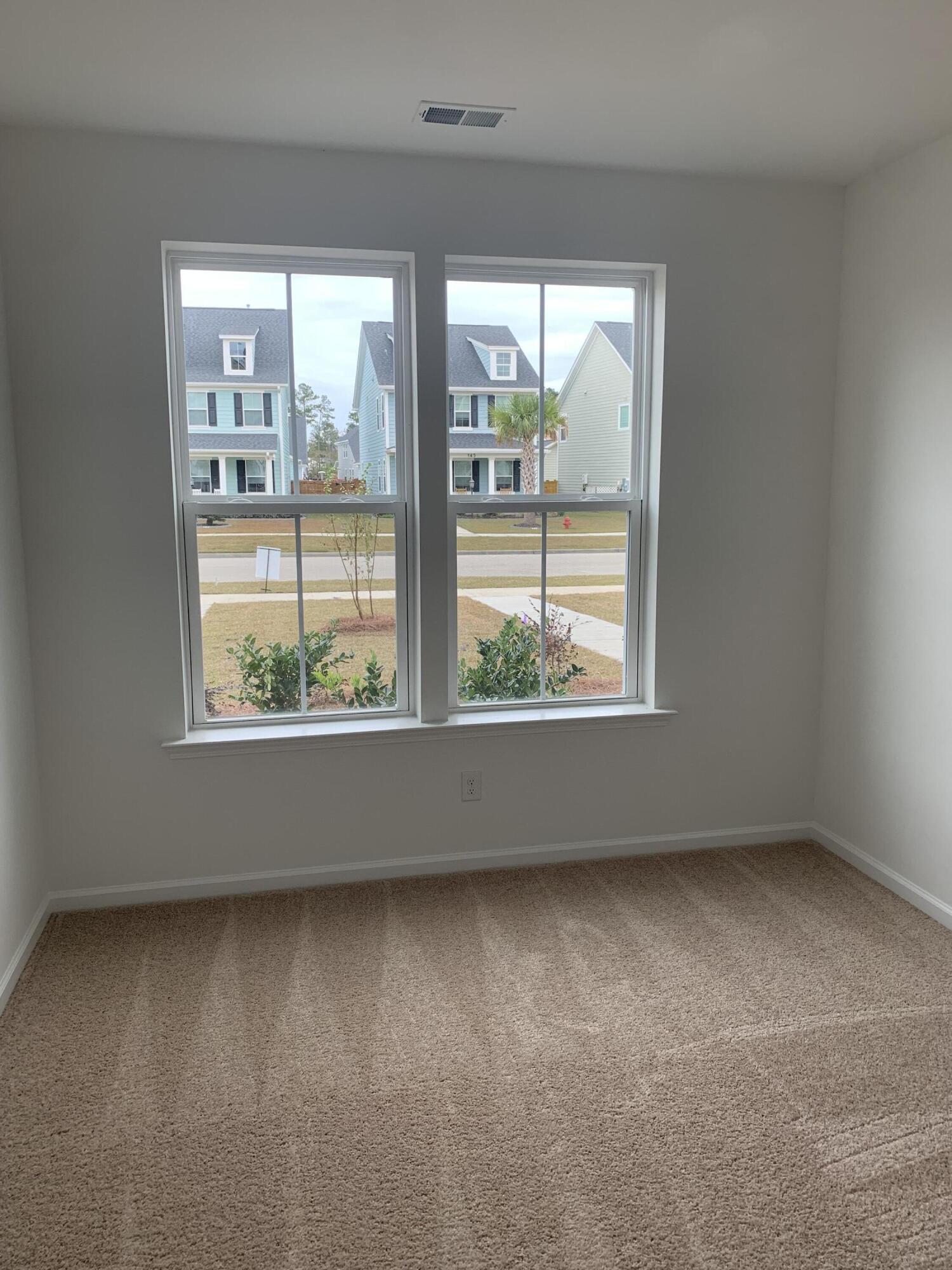 863 Recess Pointe Drive, Unit 26 Moncks Corner, SC 29461 - Photo 5 of 13 First floor guest rm