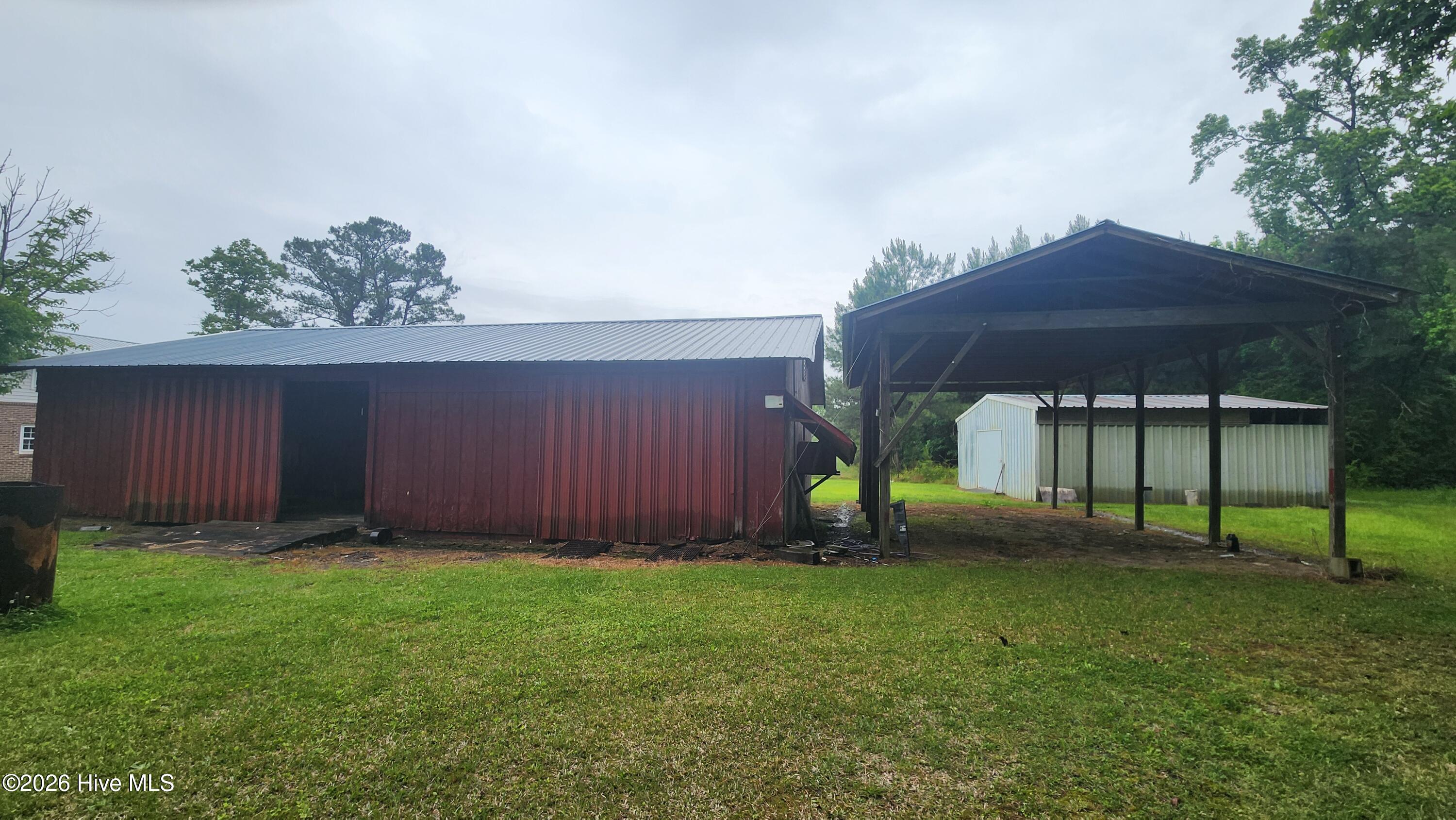 581 Hallsboro Road Clarkton, NC 28433 - Photo 6 of 16 Building 1 and Pole barn