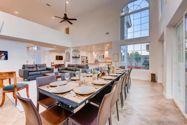 a kitchen with a table and chairs in it