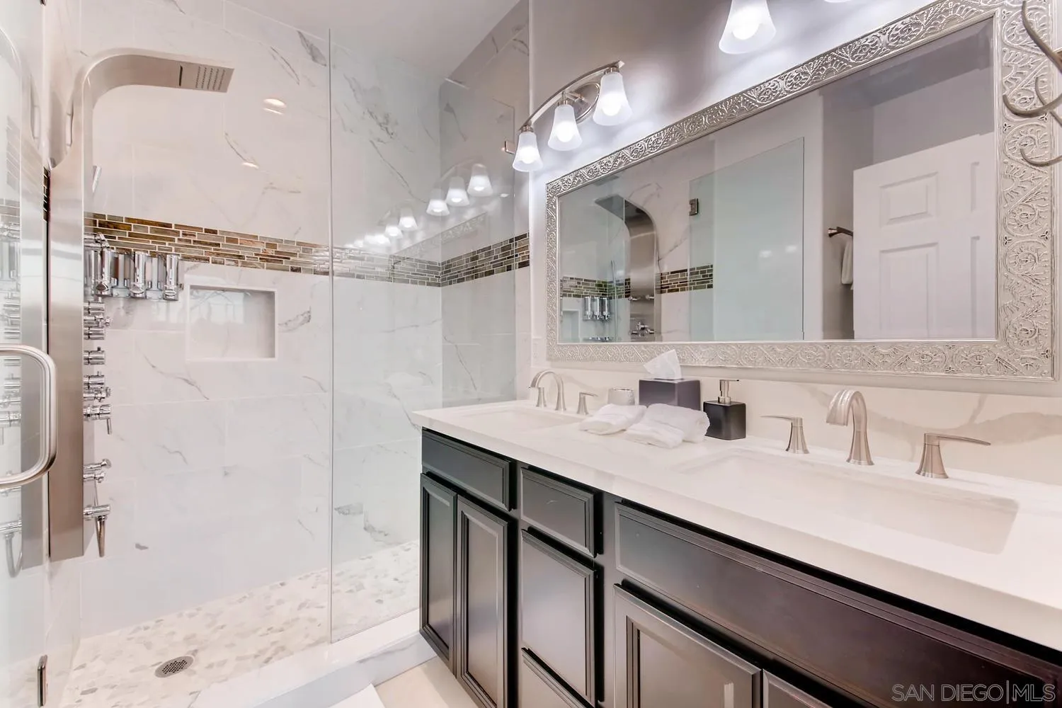 39575 Ave Ascencion Temecula, CA 92592 - Photo 34 of 68 a bathroom with a sink double vanity and a mirror
