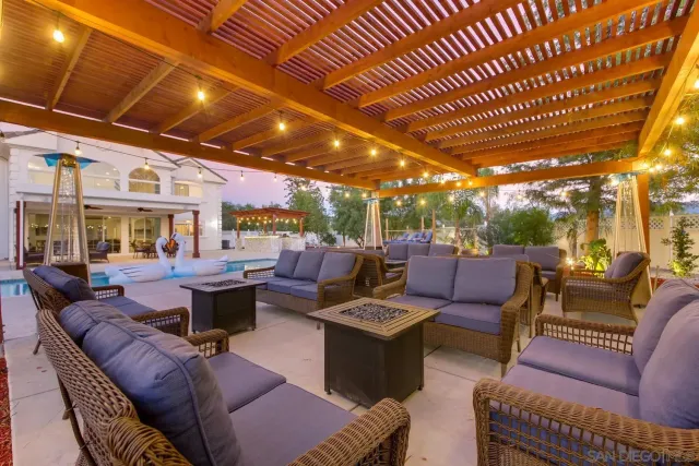 a view of outdoor space yard swimming pool and sitting area