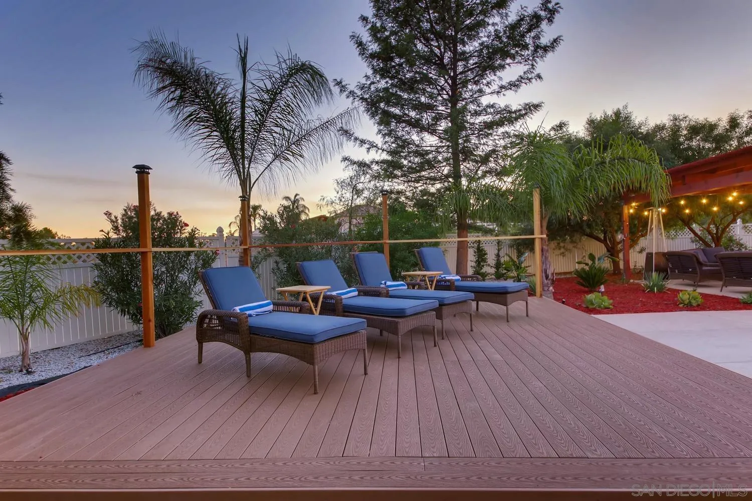 39575 Ave Ascencion Temecula, CA 92592 - Photo 48 of 68 an outdoor sitting area with furniture and wooden floor